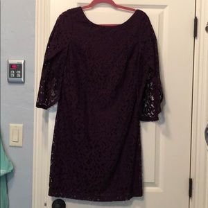 Pretty plum lace overlay dress. Flutter sleeves.